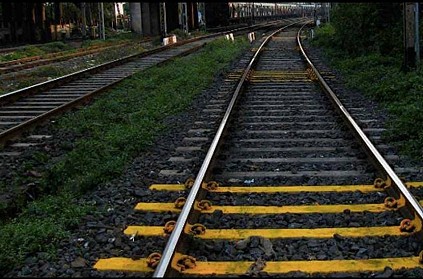 Man picks up foot cut under train to climb platform as onlookers shoot video