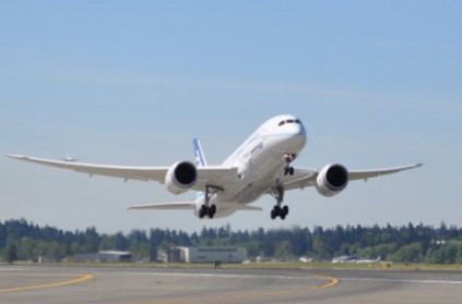 Flight hits runway light while taking off