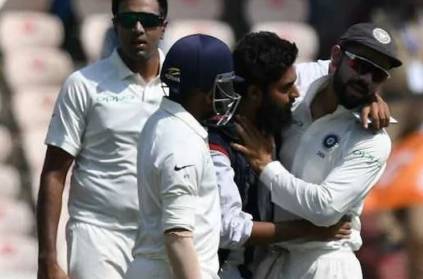 Fan breaches INDvsWI second test and tries to kiss Kohli