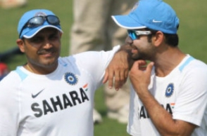 Kohli is afraid to send Dhoni up the batting order, says Sehwag